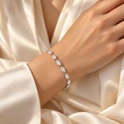 Demo additional angle: same bracelet on wrist with ivory silk